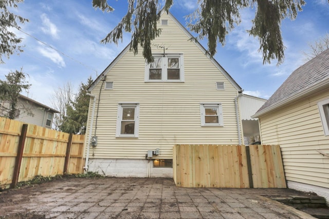 rear view of property with a patio area