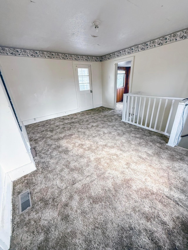 spare room with carpet floors