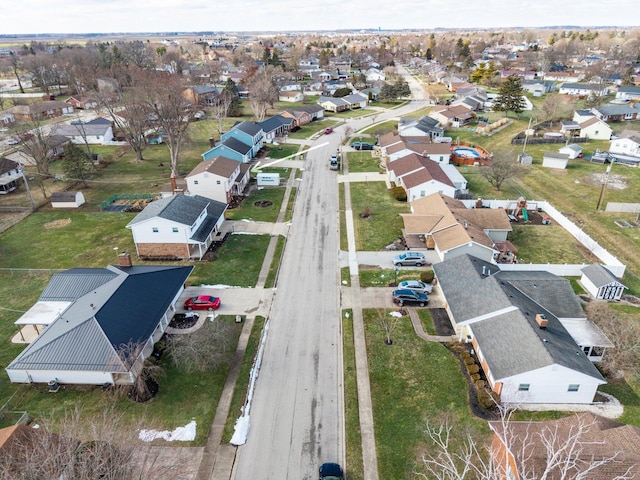 birds eye view of property with a residential view