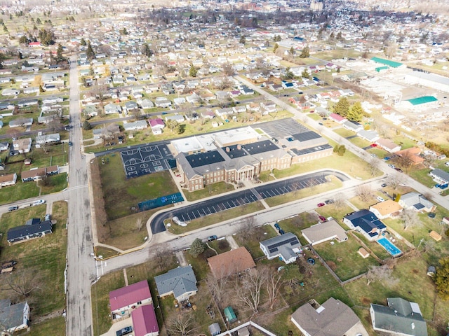 birds eye view of property with a residential view