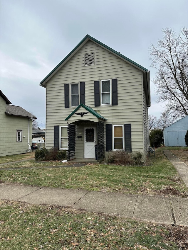 view of front property with a front lawn