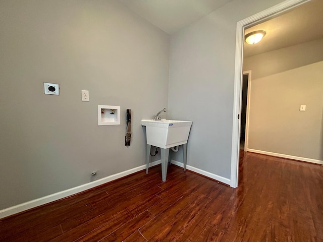 washroom with gas dryer hookup, electric dryer hookup, washer hookup, and dark hardwood / wood-style flooring