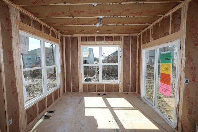 interior space with a healthy amount of sunlight and visible vents