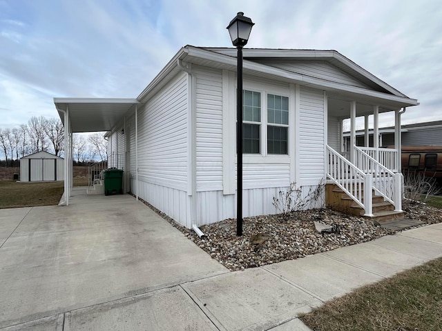 view of front facade featuring a porch and a storage unit