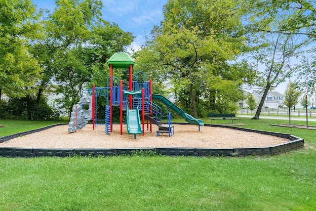 view of jungle gym with a lawn