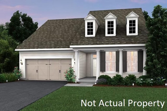 cape cod house with a front lawn, driveway, a shingled roof, and an attached garage