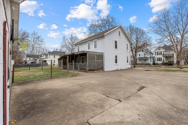 view of property exterior with a yard