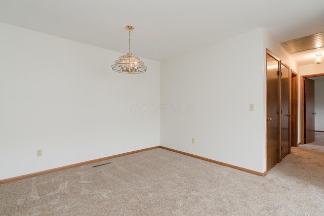 empty room featuring carpet floors