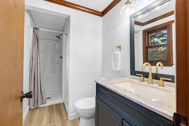 bathroom with hardwood / wood-style flooring, vanity, ornamental molding, curtained shower, and toilet