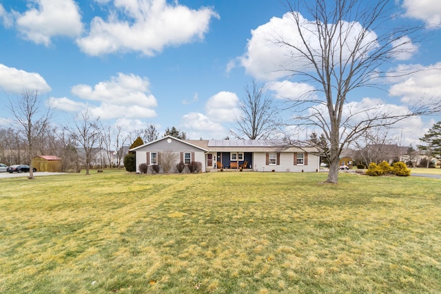 ranch-style home with a porch and a front lawn