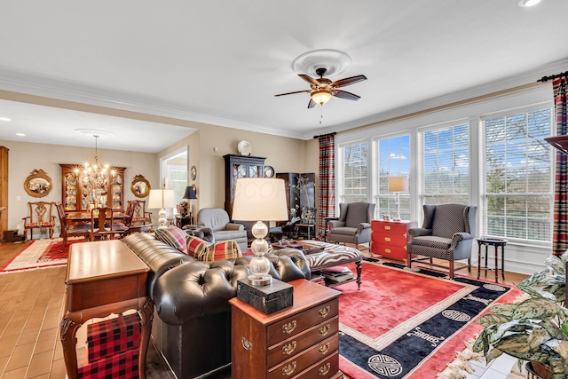 living room featuring ornamental molding, ceiling fan with notable chandelier, and light hardwood / wood-style flooring