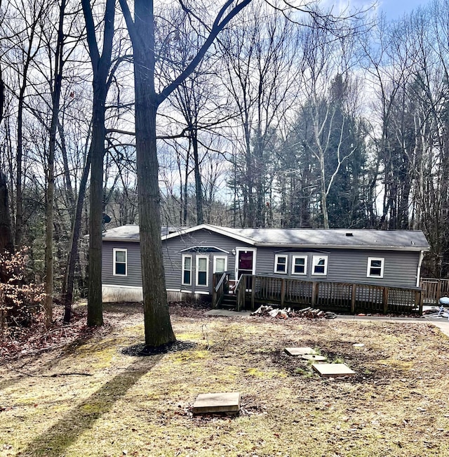 view of front of property with a deck