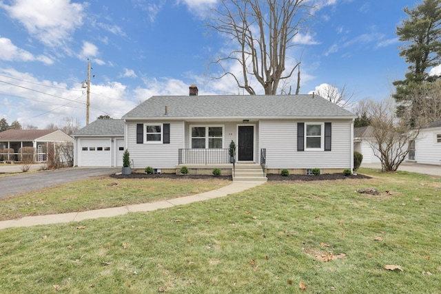 view of front of home with a porch, a garage, an outdoor structure, and a front lawn