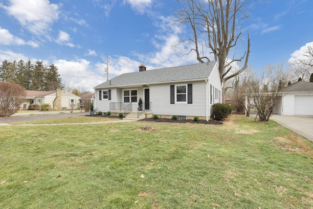 view of front of house featuring a garage and a front lawn