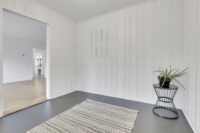 unfurnished room featuring dark hardwood / wood-style flooring