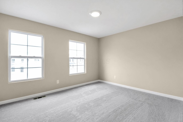 view of carpeted spare room