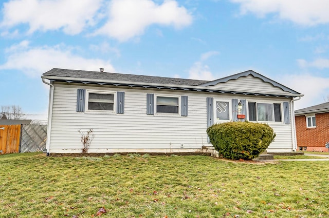 view of front of house with a front lawn