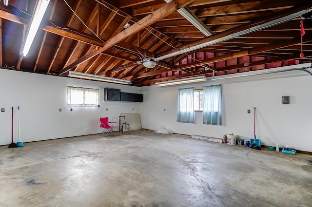 garage featuring a garage door opener