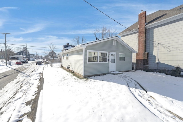 view of snow covered house