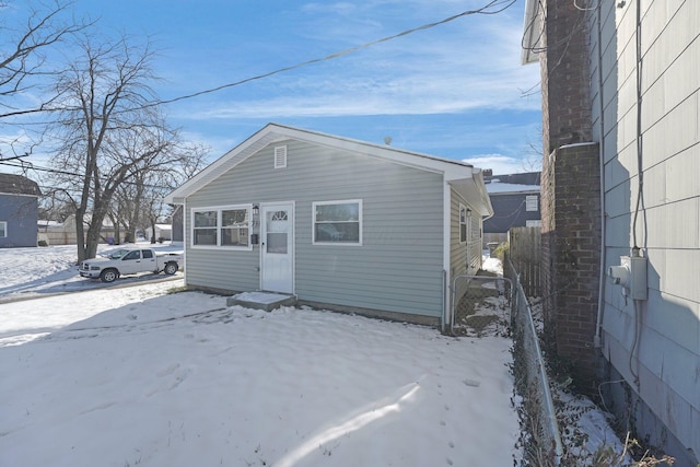 view of snow covered property