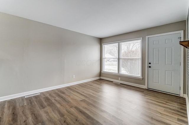 foyer entrance featuring hardwood / wood-style flooring