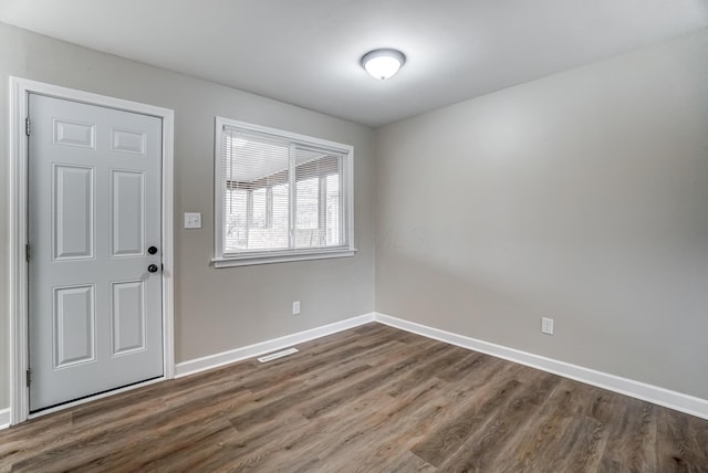 entrance foyer featuring hardwood / wood-style floors