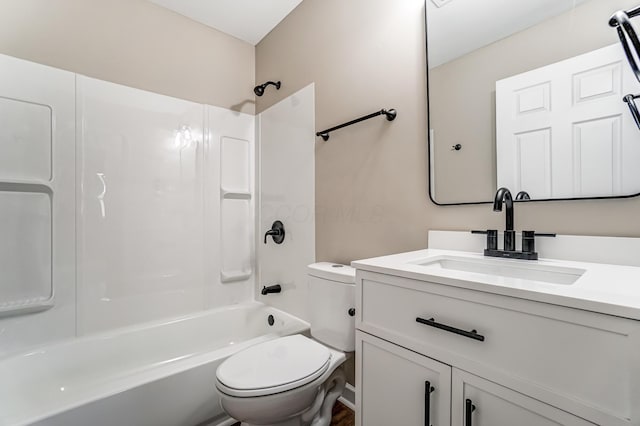 full bathroom with shower / tub combination, vanity, and toilet