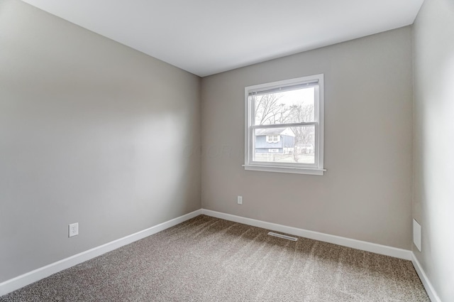 view of carpeted spare room