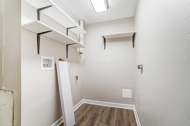 laundry room with hookup for a washing machine and dark wood-type flooring