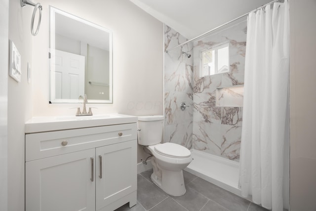 bathroom with vanity, curtained shower, and toilet