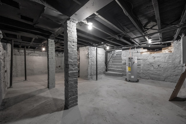 basement featuring electric water heater