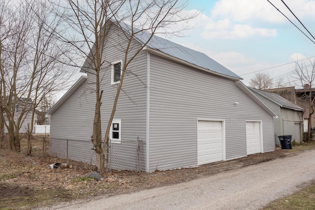 view of home's exterior with a garage