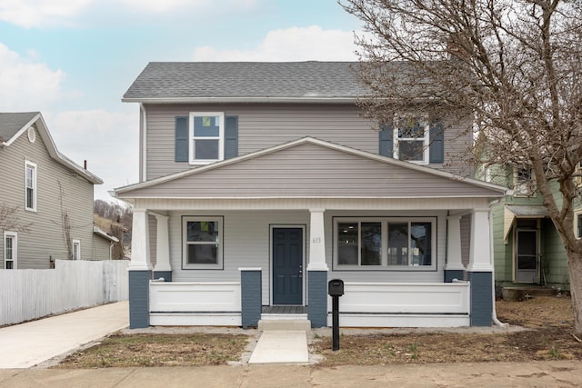 view of property with covered porch