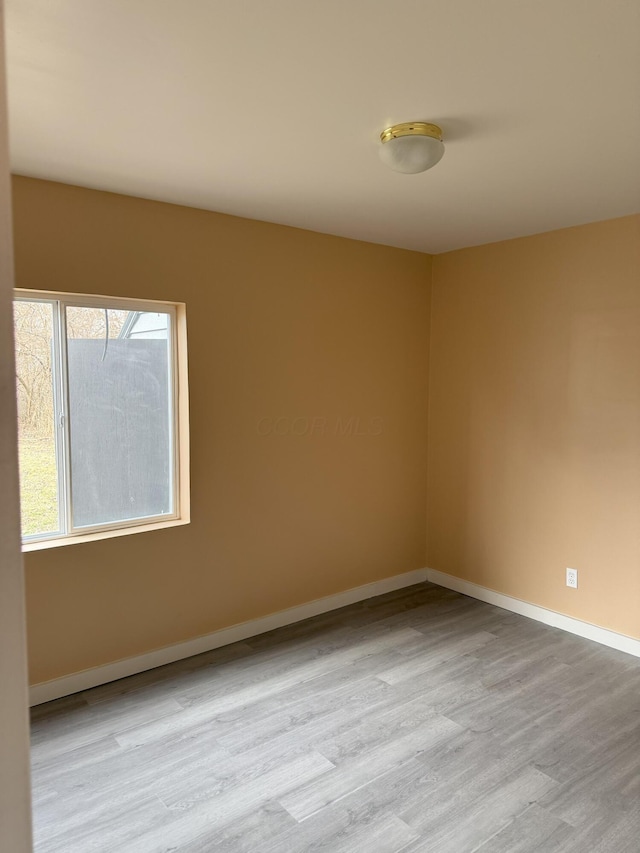 empty room featuring light wood-type flooring