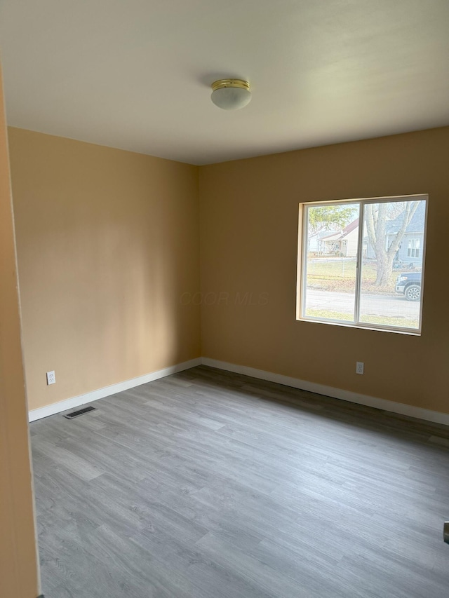 empty room featuring light wood-type flooring