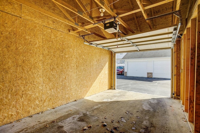 garage featuring a garage door opener