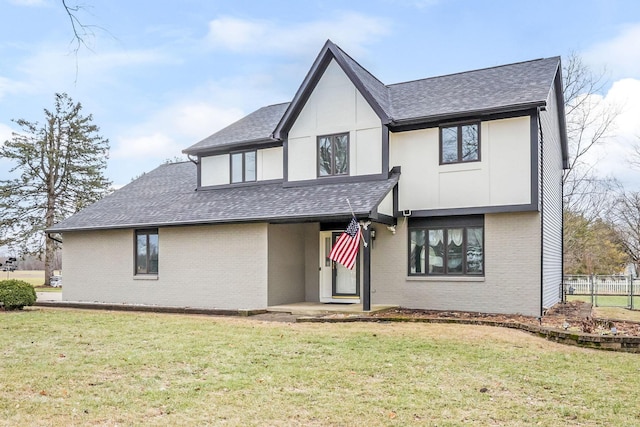 view of front facade with a front lawn