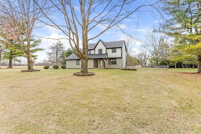 view of front of house with a front lawn