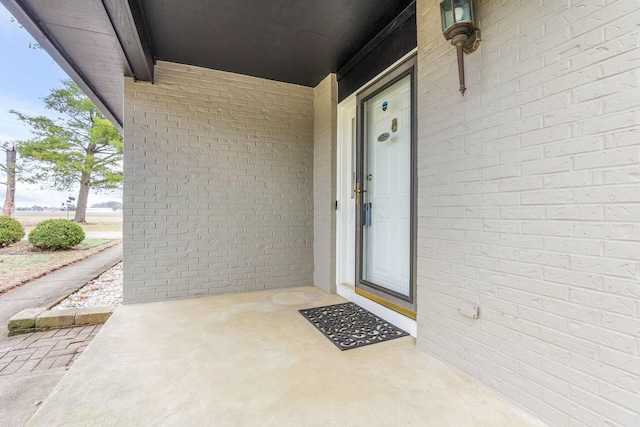 property entrance with covered porch