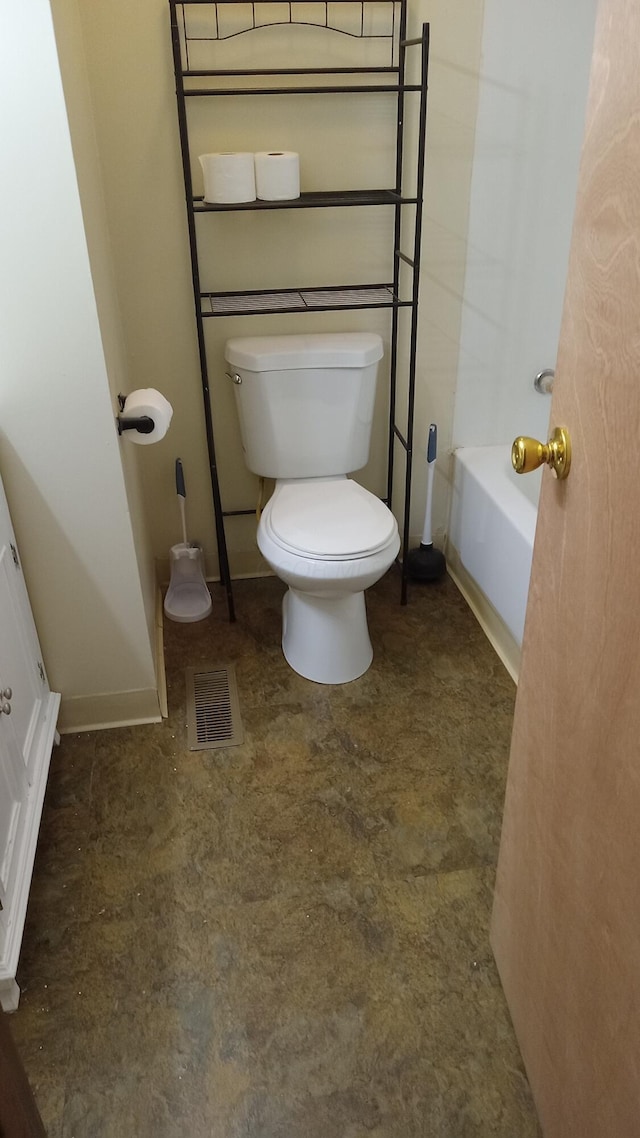 bathroom featuring toilet