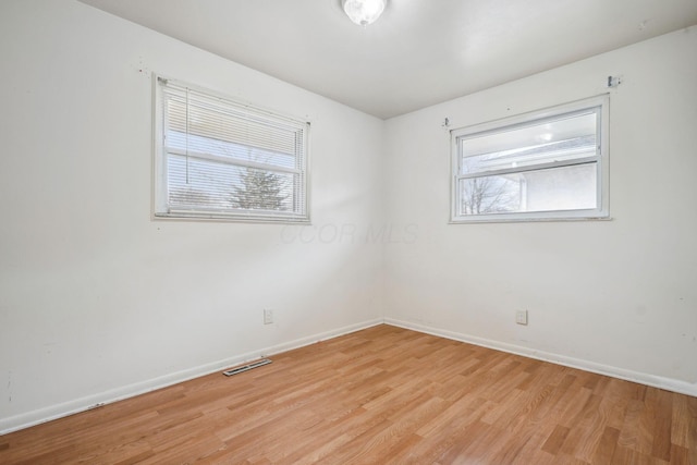 empty room featuring light hardwood / wood-style floors