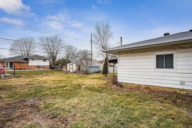 view of yard featuring a shed