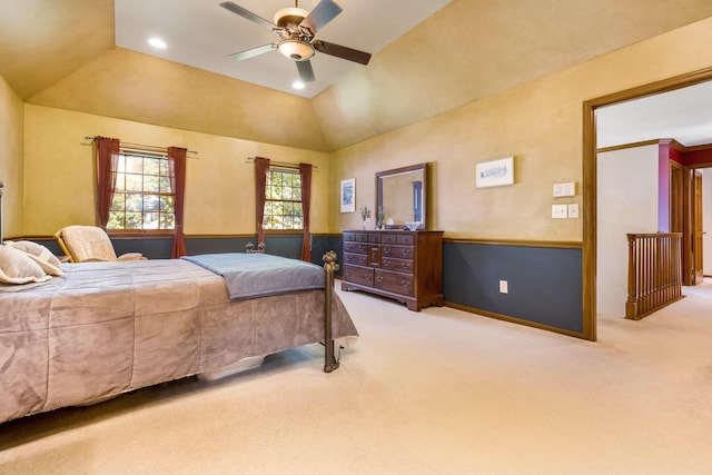 bedroom featuring light carpet, vaulted ceiling, and ceiling fan