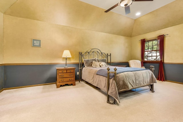 carpeted bedroom featuring vaulted ceiling and ceiling fan