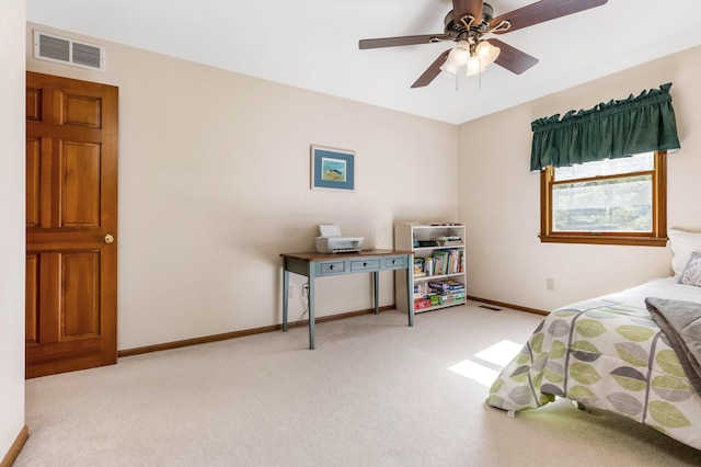 bedroom with light carpet and ceiling fan