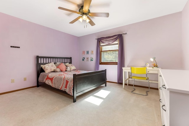 bedroom with light carpet and ceiling fan