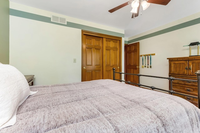 bedroom with a closet and ceiling fan