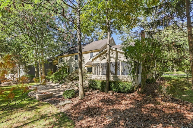 5640 Morlich Sq, Dublin, OH 43017 - view of home's exterior featuring a sunroom and a patio