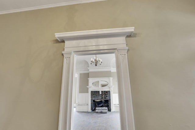 corridor featuring crown molding