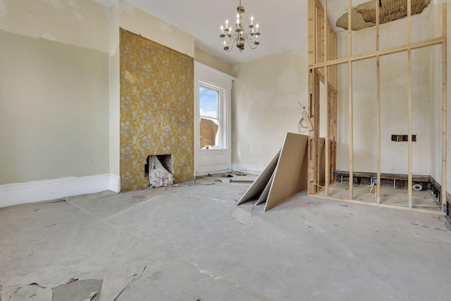 miscellaneous room featuring a notable chandelier